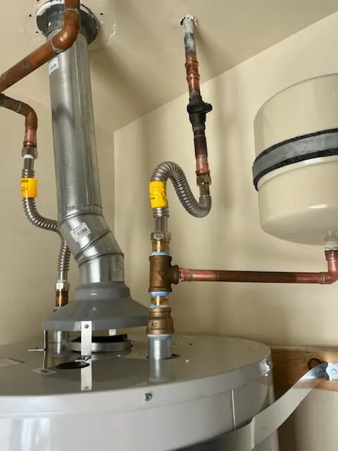 Water heater installation and plumbing repair in The Acreage